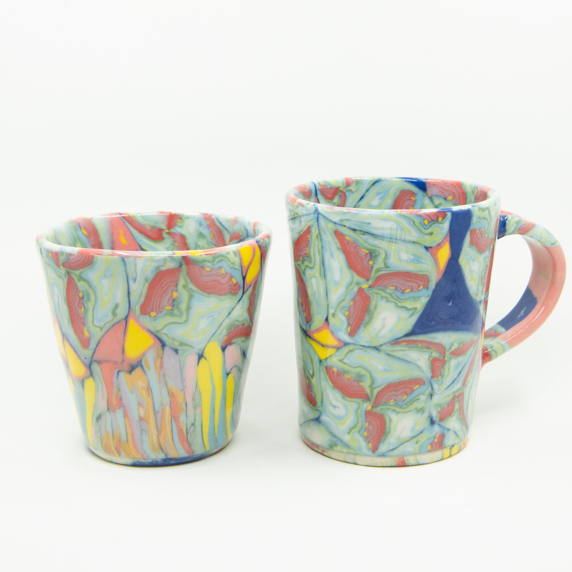 Colored clay handmade cup and mug.