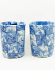 Handmade blue and white patterned cup and mug. 